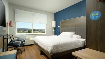 Desk, laptop workspace, blackout curtains, iron/ironing board