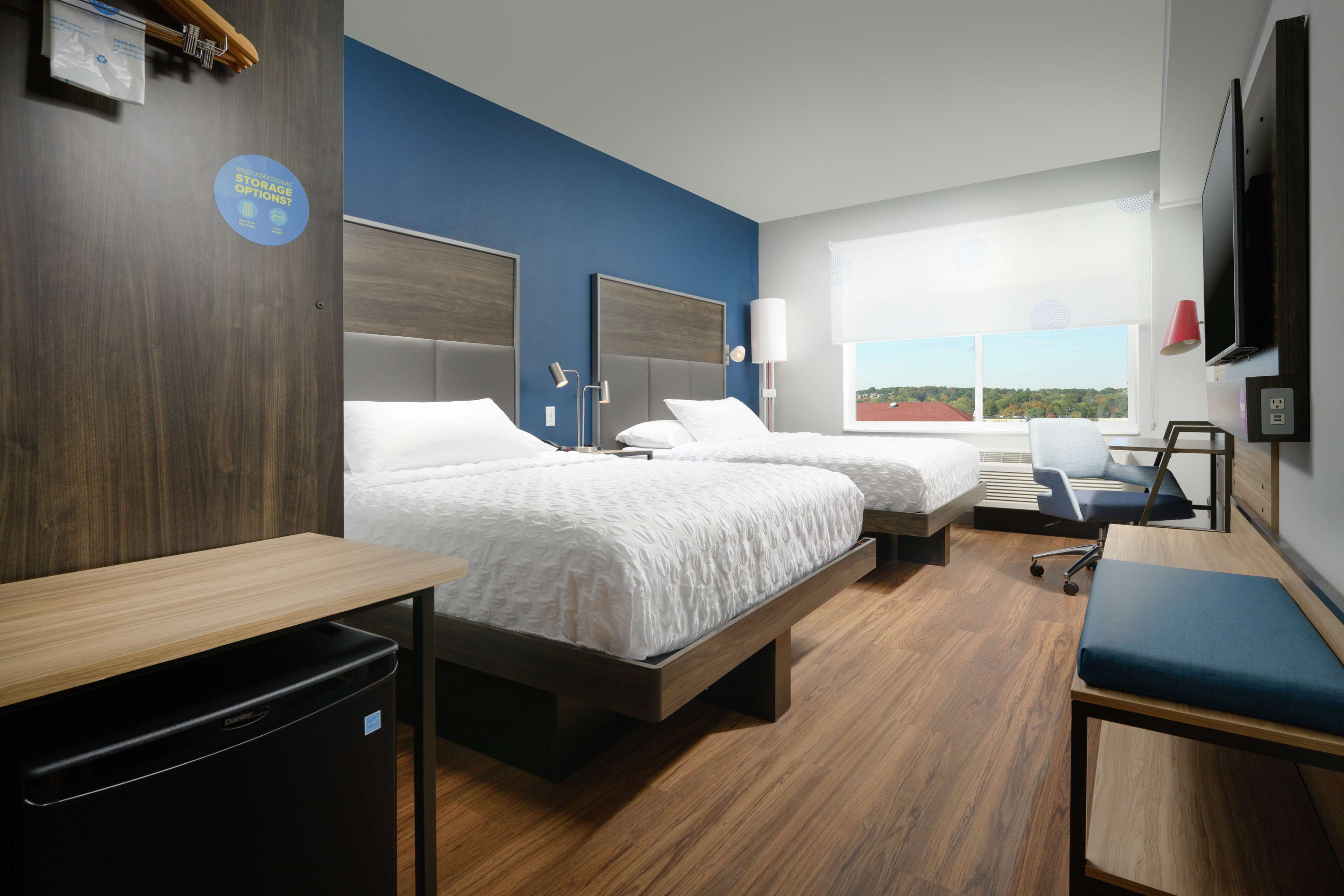 desk, laptop workspace, blackout curtains, iron/ironing board