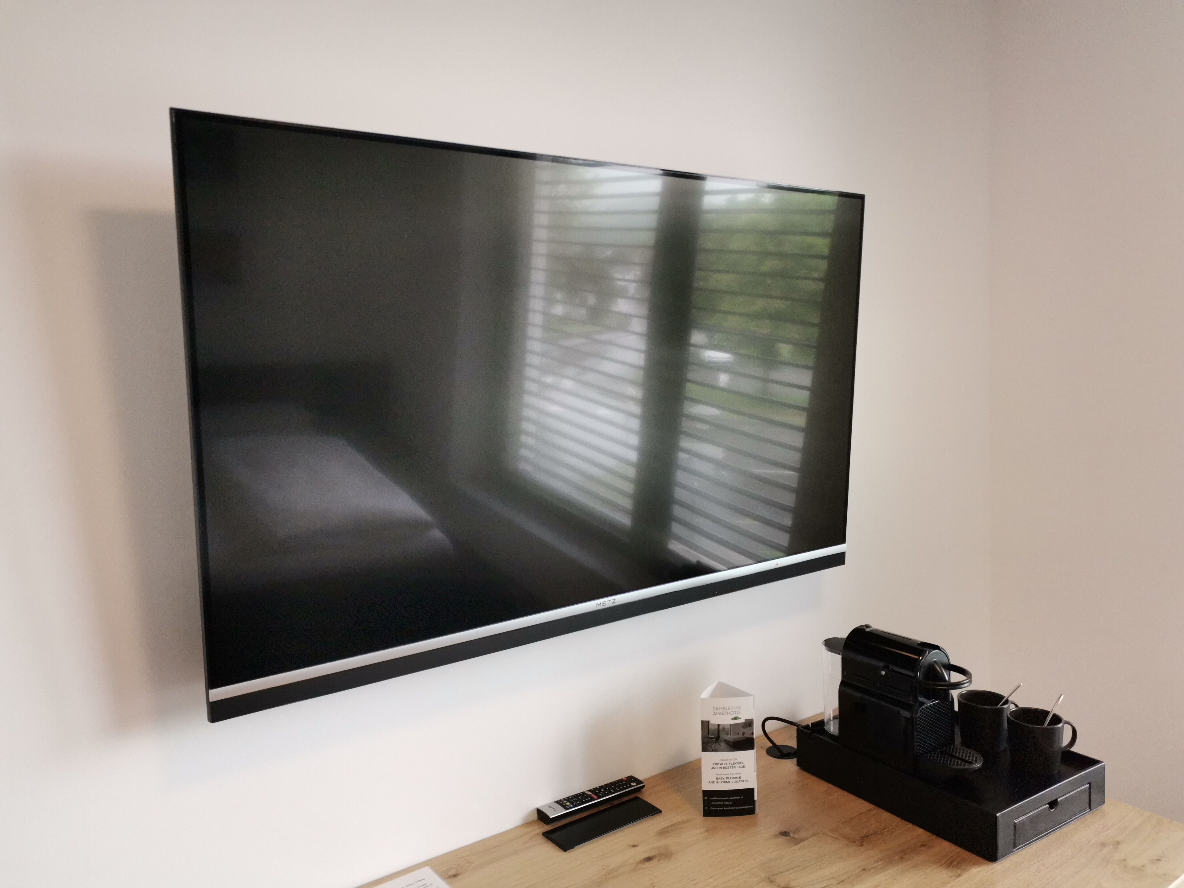 50-inch flat-screen TV with cable channels, TV