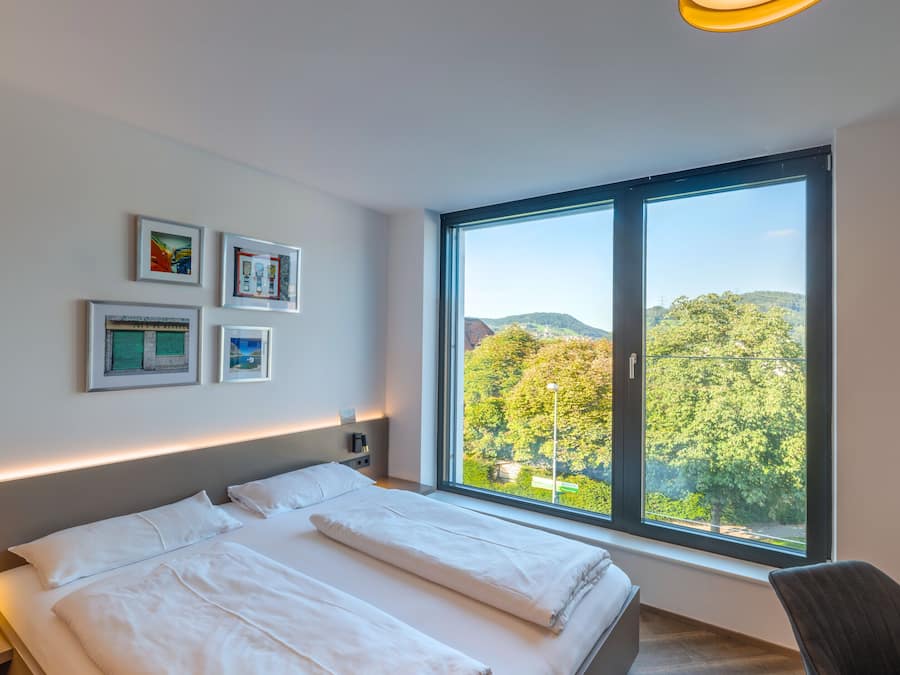 Premium bedding, individually furnished, desk, laptop workspace