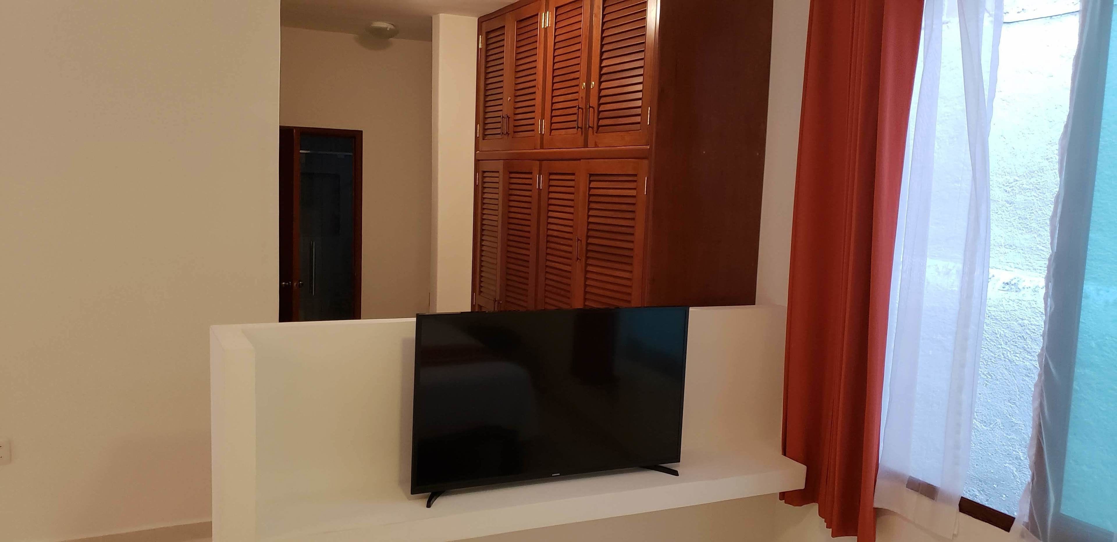 deluxe room, 1 king bed, pool view | 1 bedroom, in-room safe, iron/ironing board, free cots/infant beds