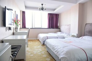 A hotel room with two beds, a desk, a chair, a mirror, and a window with curtains. - Jiaxing ShiMao Inn (Jiaxing)