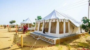 A desert tent with a flat roof and a small porch area. - Desert Raasleela Camp (Jaisalmer)