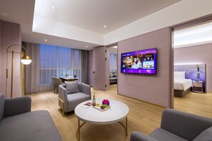 Suite Signature | Edredones de plumas, colchones viscoelásticos, minibar