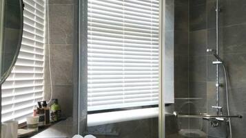 Shower, free toiletries, hair dryer, slippers