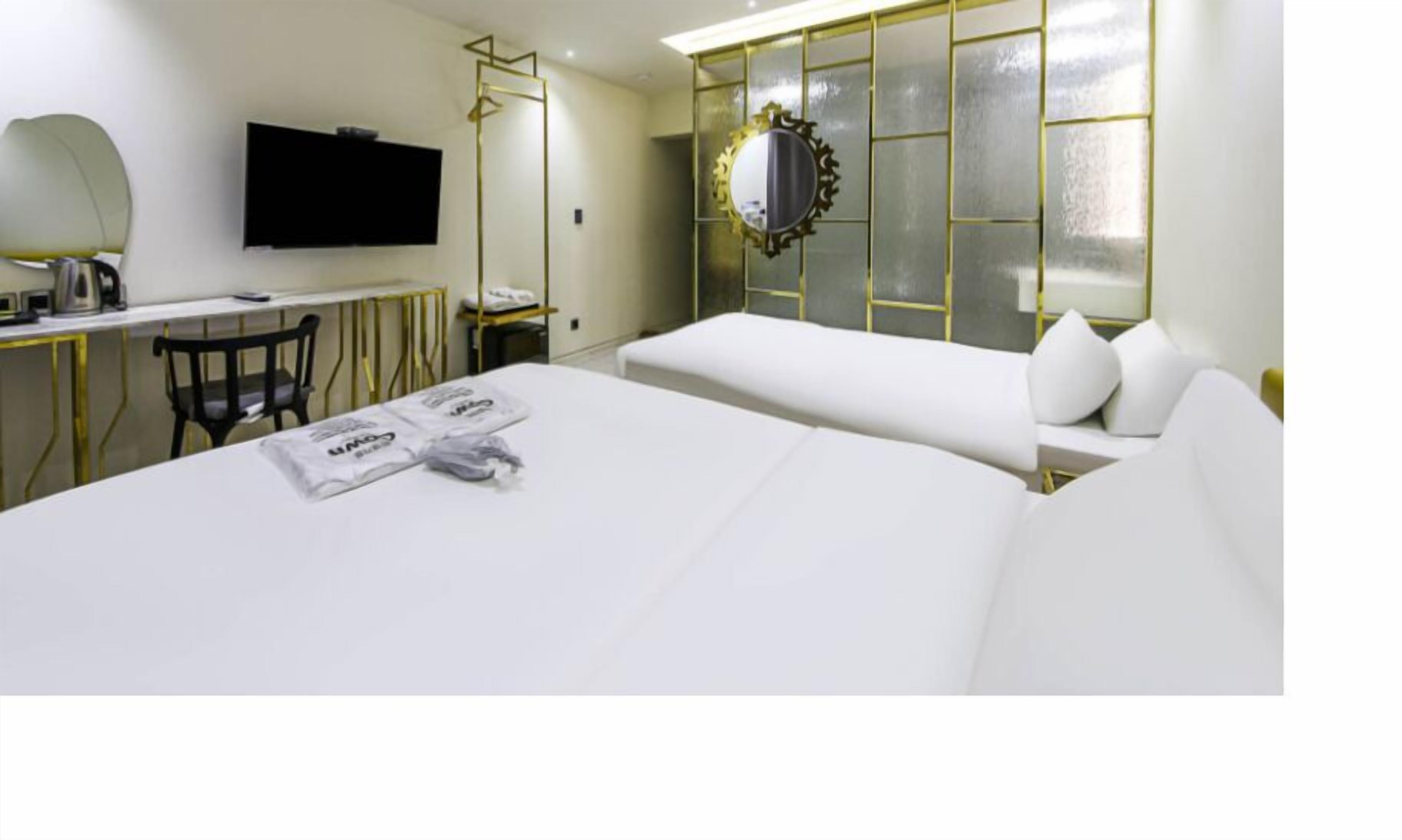 deluxe twin room | memory-foam beds, blackout curtains, free wifi, bed sheets