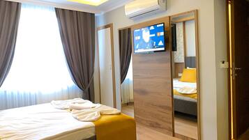 Blackout drapes, iron/ironing board, free WiFi, bed sheets