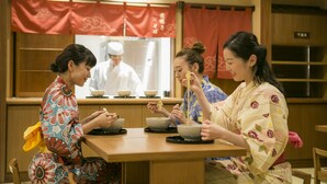 A traditional Japanese restaurant with wooden interiors and red curtains. - Oyado Tsukiyonousagi (Izumo)