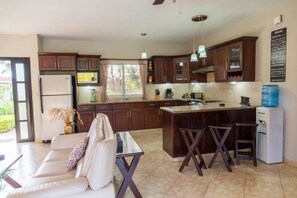 Oven, stovetop, espresso maker, cookware/dishes/utensils