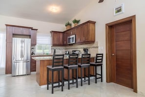 Mini-fridge, oven, stovetop, espresso maker