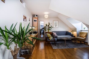 Comfort Apartment, 3 Bedrooms | Living area | Flat-screen TV - Apartment M35 (Reykjavik)