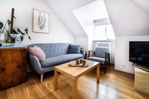 Comfort Apartment, 3 Bedrooms | Living area | Flat-screen TV - Apartment M35 (Reykjavik)