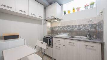 Basic Apartment | Private kitchen | Fridge, microwave, stovetop, espresso maker