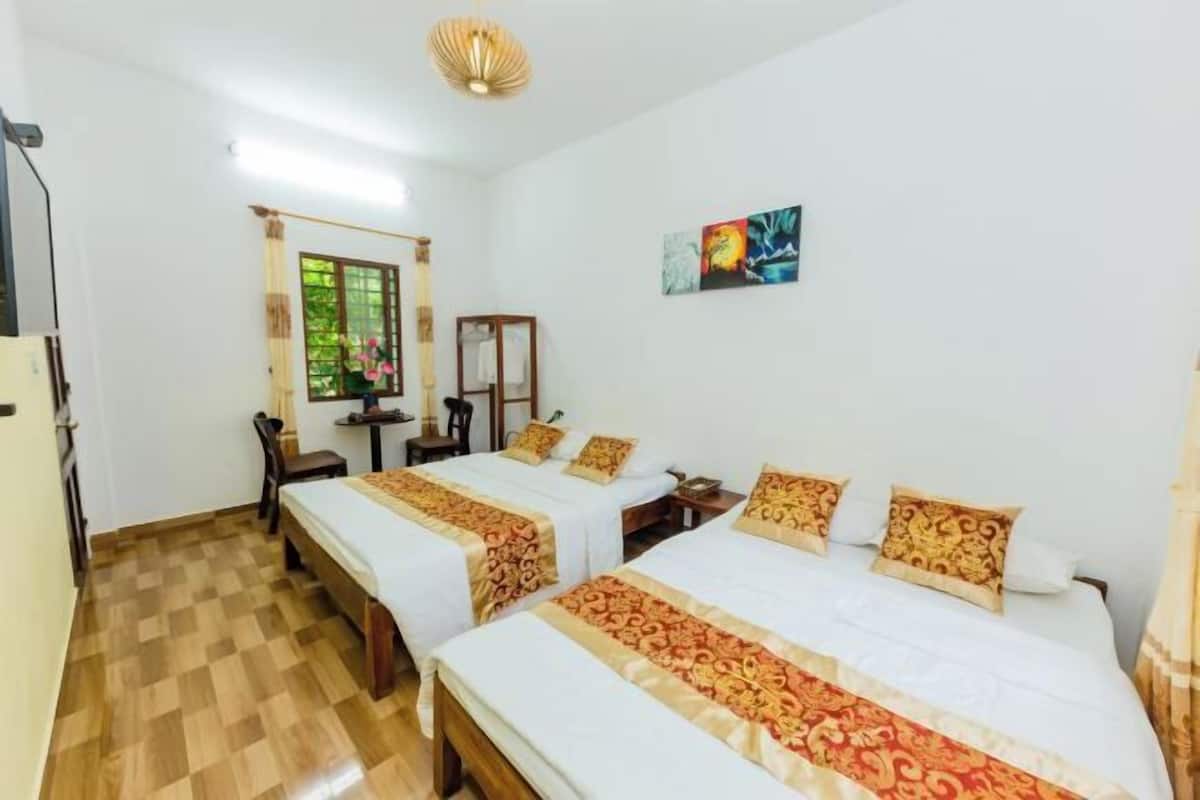 Premium bedding, down comforters, desk, laptop workspace