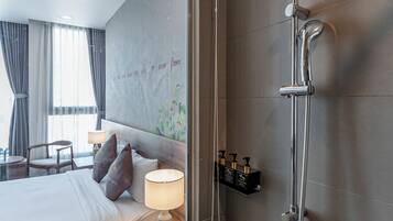 Deluxe Double Room, City View | Bathroom | Shower, rainfall showerhead, free toiletries, hair dryer