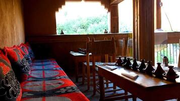 Breakfast, lunch, dinner served; local cuisine