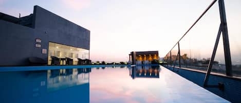 Outdoor pool, a rooftop pool, open 8:00 AM to 6:00 PM, sun loungers