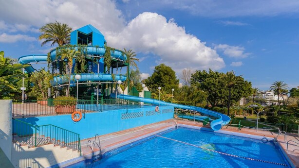 Outdoor pool, a heated pool, pool loungers - Benal Beach 907 - First Line Beach 2BR Apartment in Benal Beach Resort with Water park. (Benalmádena)