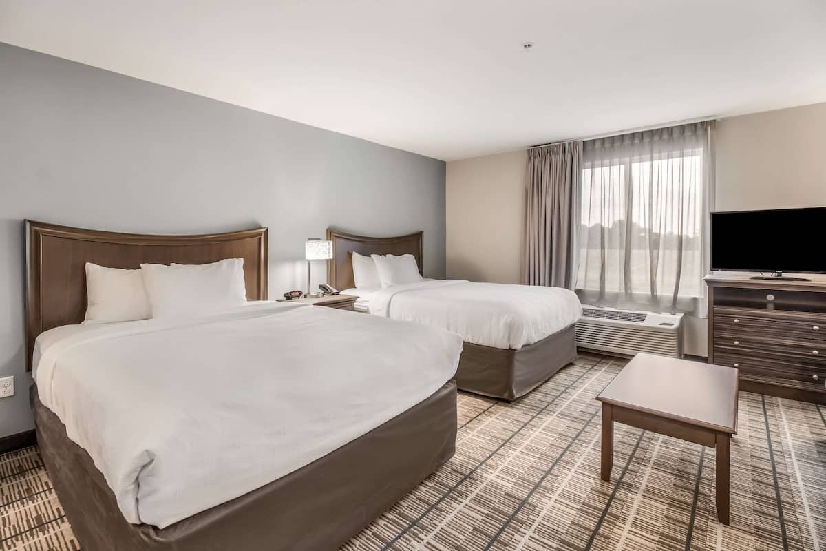 suite, 2 queen beds, non smoking | individually furnished, desk, laptop workspace, blackout curtains