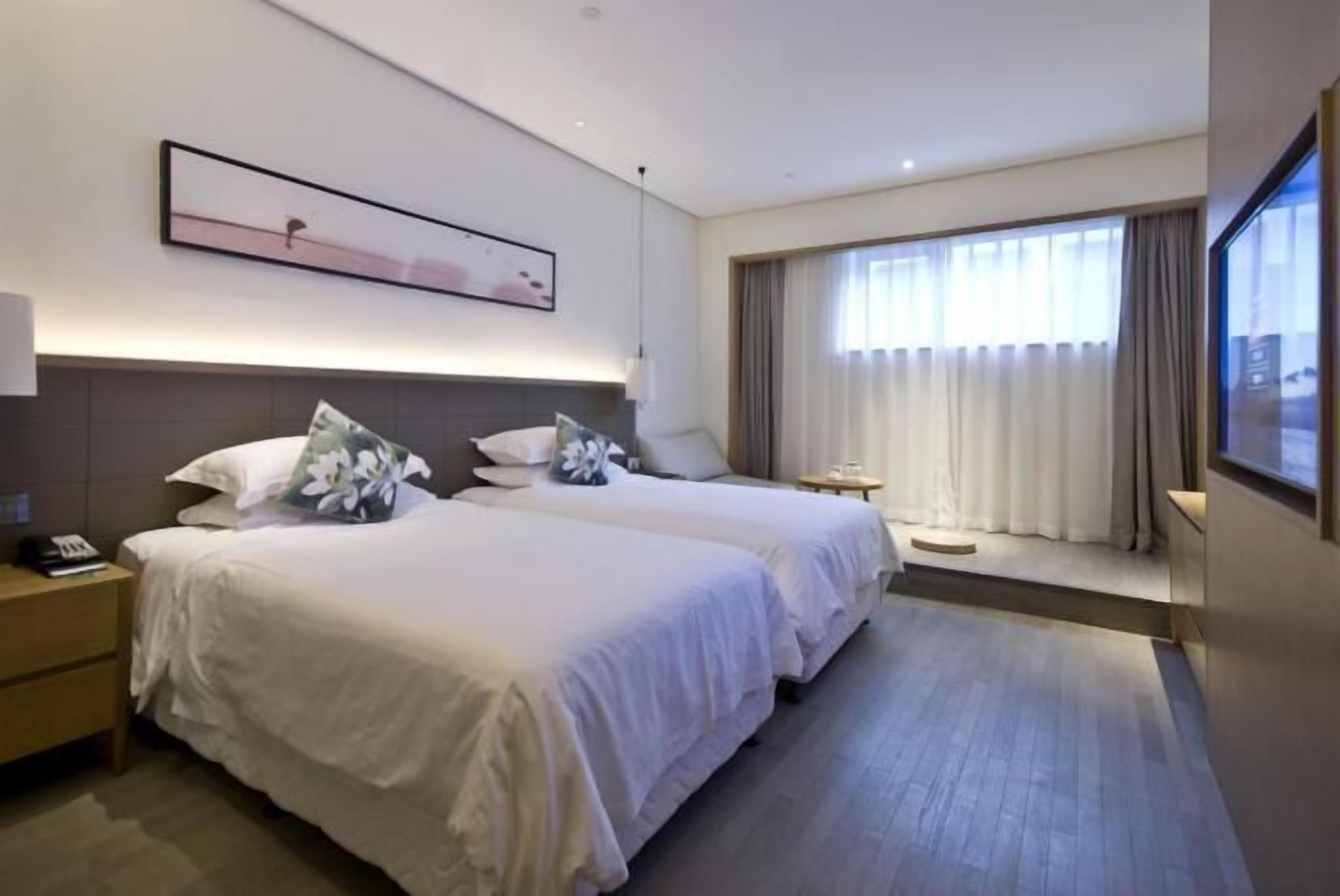 Superior tvåbäddsrum | Minibar, skrivbord, mörkläggningsgardiner och gratis wi-fi