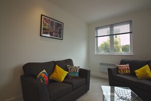 Apartment 16 (Sleeps 6) | Living area | Flat-screen TV