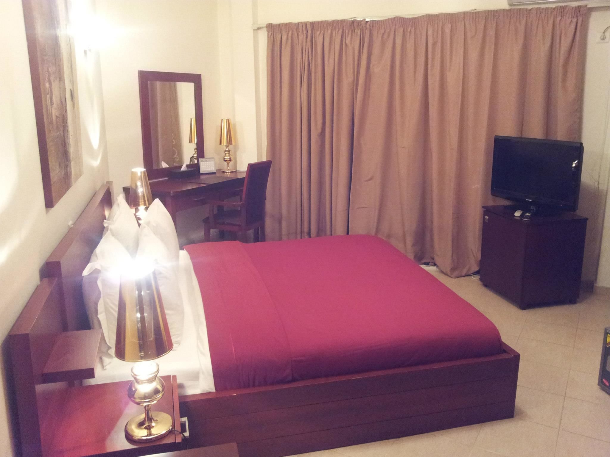 suite | minibar, desk, blackout curtains, iron/ironing board