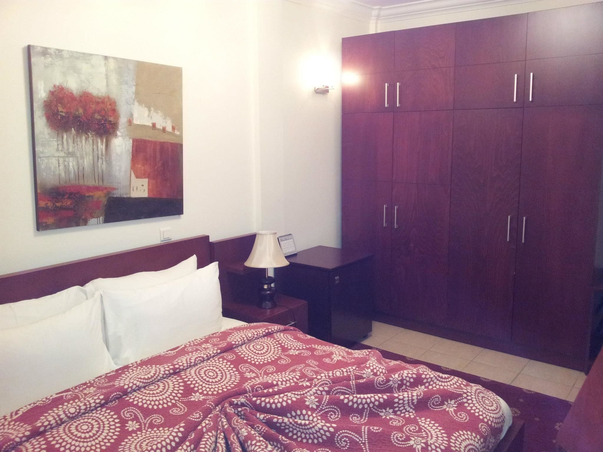 minibar, desk, blackout curtains, iron/ironing board