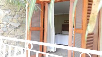 Quarto casal premium | Vista para o jardim