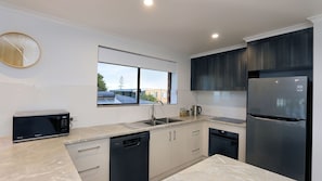 Fridge, microwave, oven, stovetop - "Horizons" Unit 4 - Beachfront Unit (BARGARA)