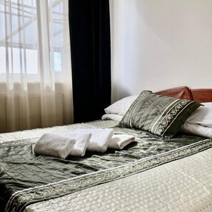 Eenvoudige kamer, 1 twee- of 2 eenpersoonsbedden | Beddengoed