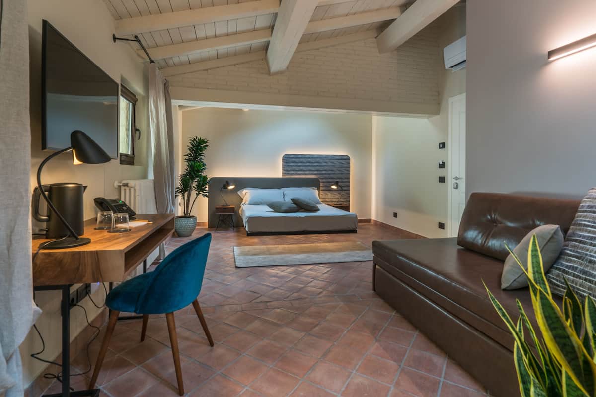 Habitación Deluxe con 1 cama matrimonial o 2 individuales (Lunaria) | Ropa de cama de alta calidad, edredón, camas con pillow-top y minibar