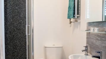 Shower, free toiletries, hair dryer, towels