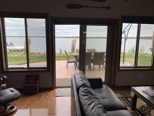 Spacious lake home to swim and fish on, amazing views and convenient location.