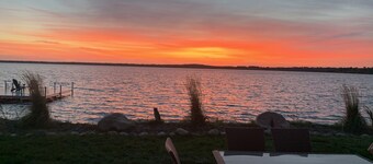 Spacious lake home to swim and fish on, amazing views and convenient location.