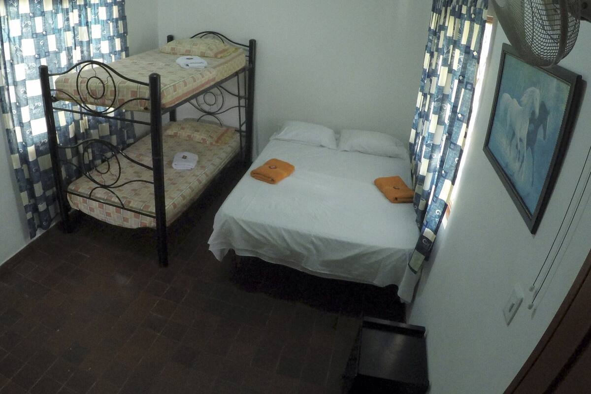 Habitació quàdruple familiar | Roba de llit 
