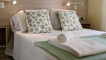 5 slaapkamers, een strijkplank/strijkijzer, beddengoed