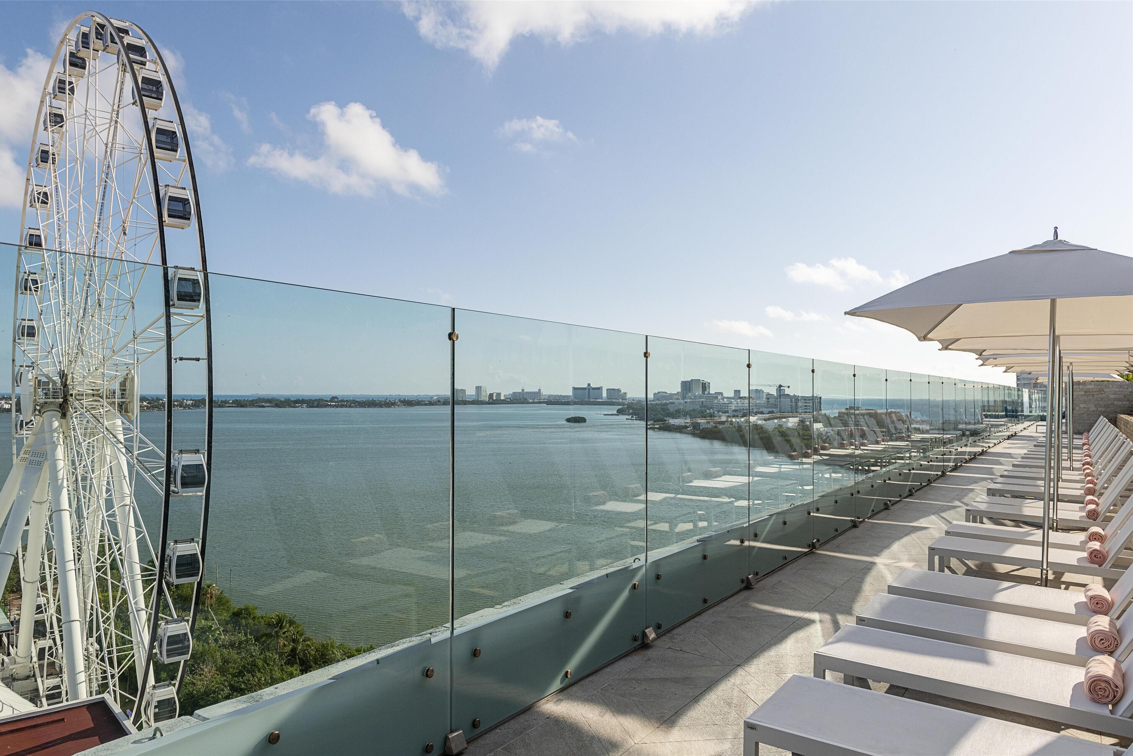 outdoor pool, open 7:00 am to 11:00 pm, pool loungers