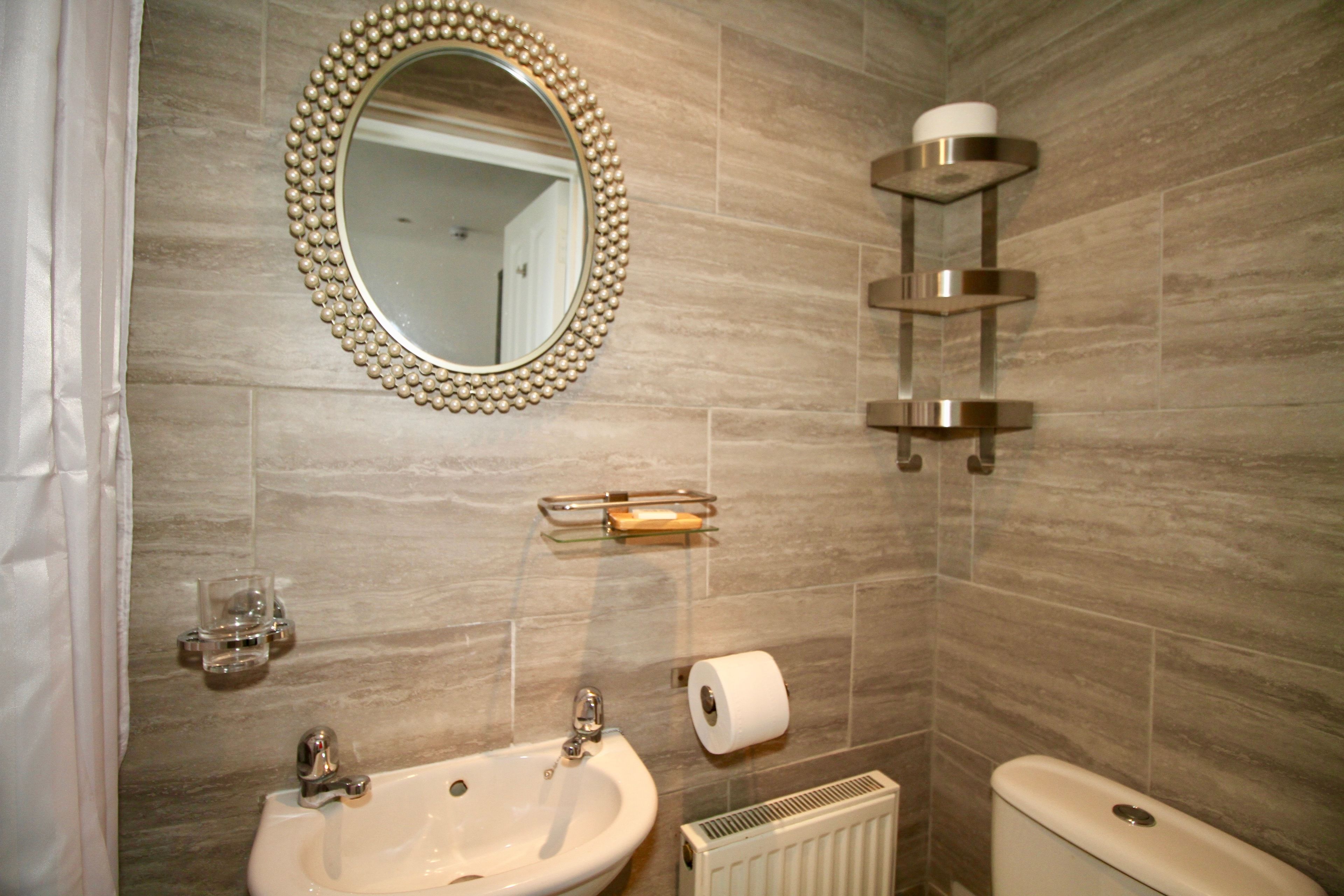 classic double room, 1 king bed | bathroom | combined shower/bathtub, deep-soaking bathtub, designer toiletries