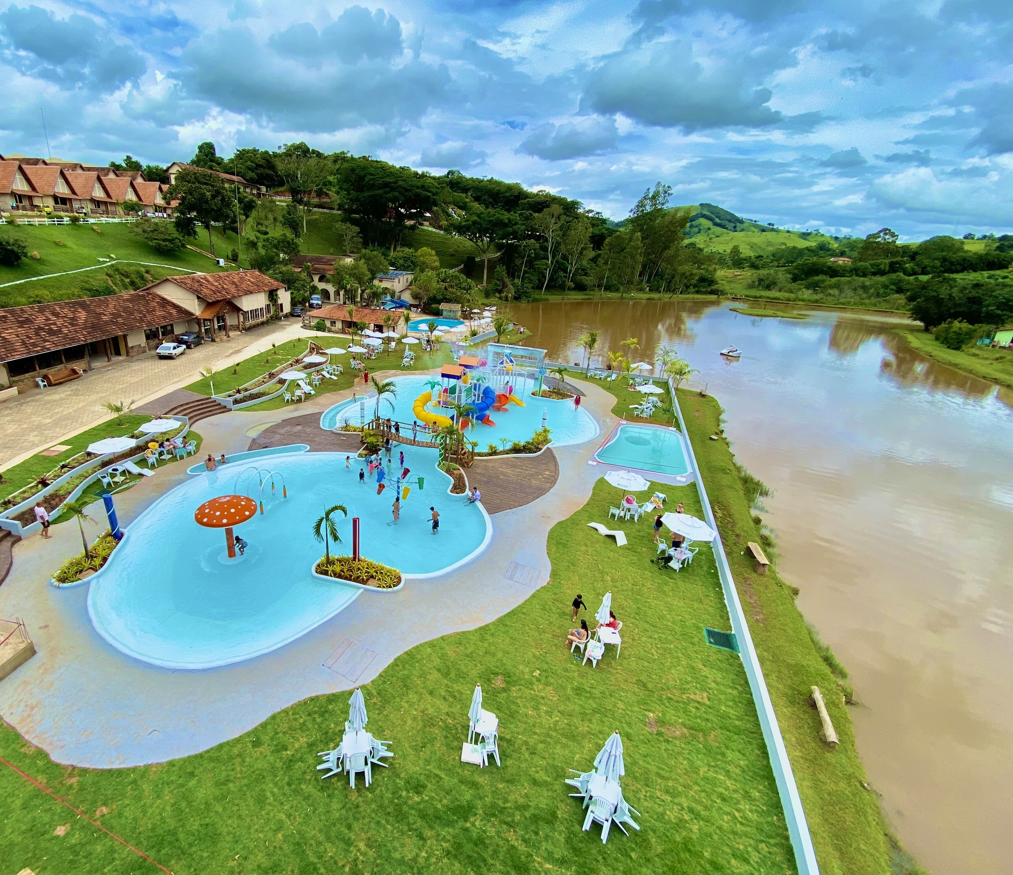 A water park with multiple pools, slides, and a river.
