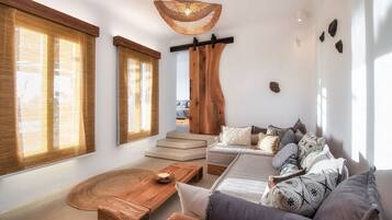 Smart-tv, eldstad, böcker och en stereo