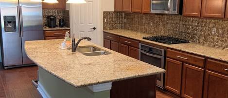 Fridge, microwave, dishwasher, coffee/tea maker