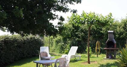 Villa in private seaside residence in shady park.