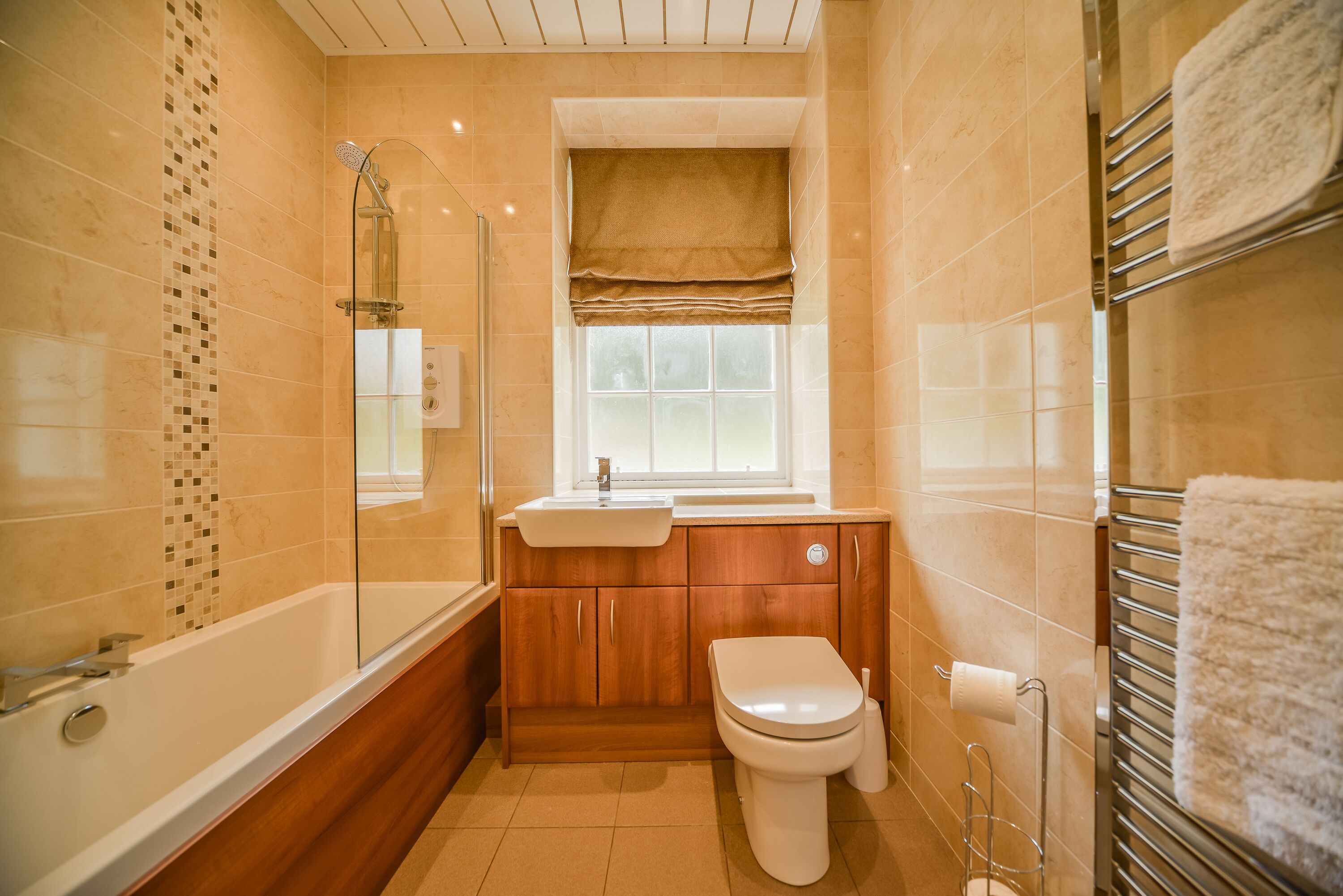 Combined shower/bathtub, towels, soap