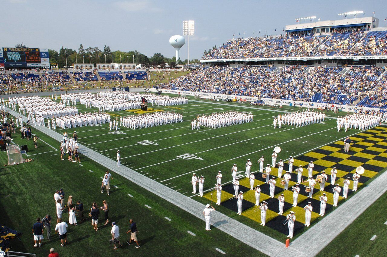 A football field with a marching band formation.