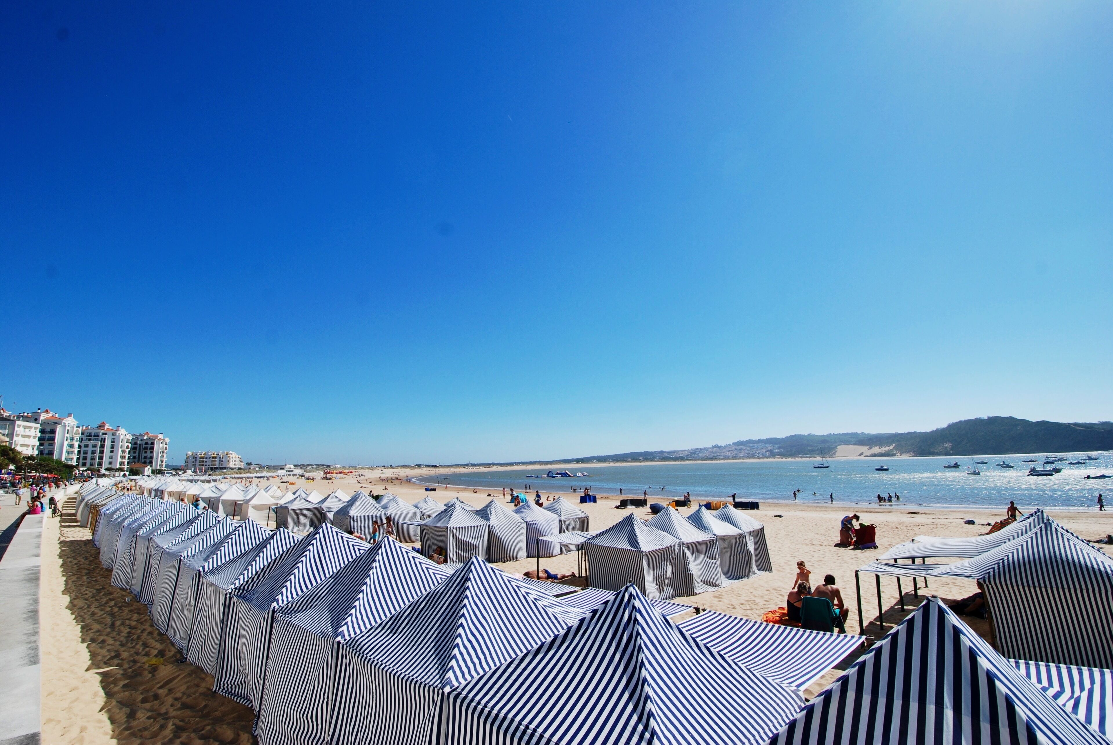 On the beach, sun loungers