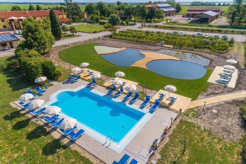 Détendez-vous à Tenuta Regina en séjournant dans notre Airone près des piscines