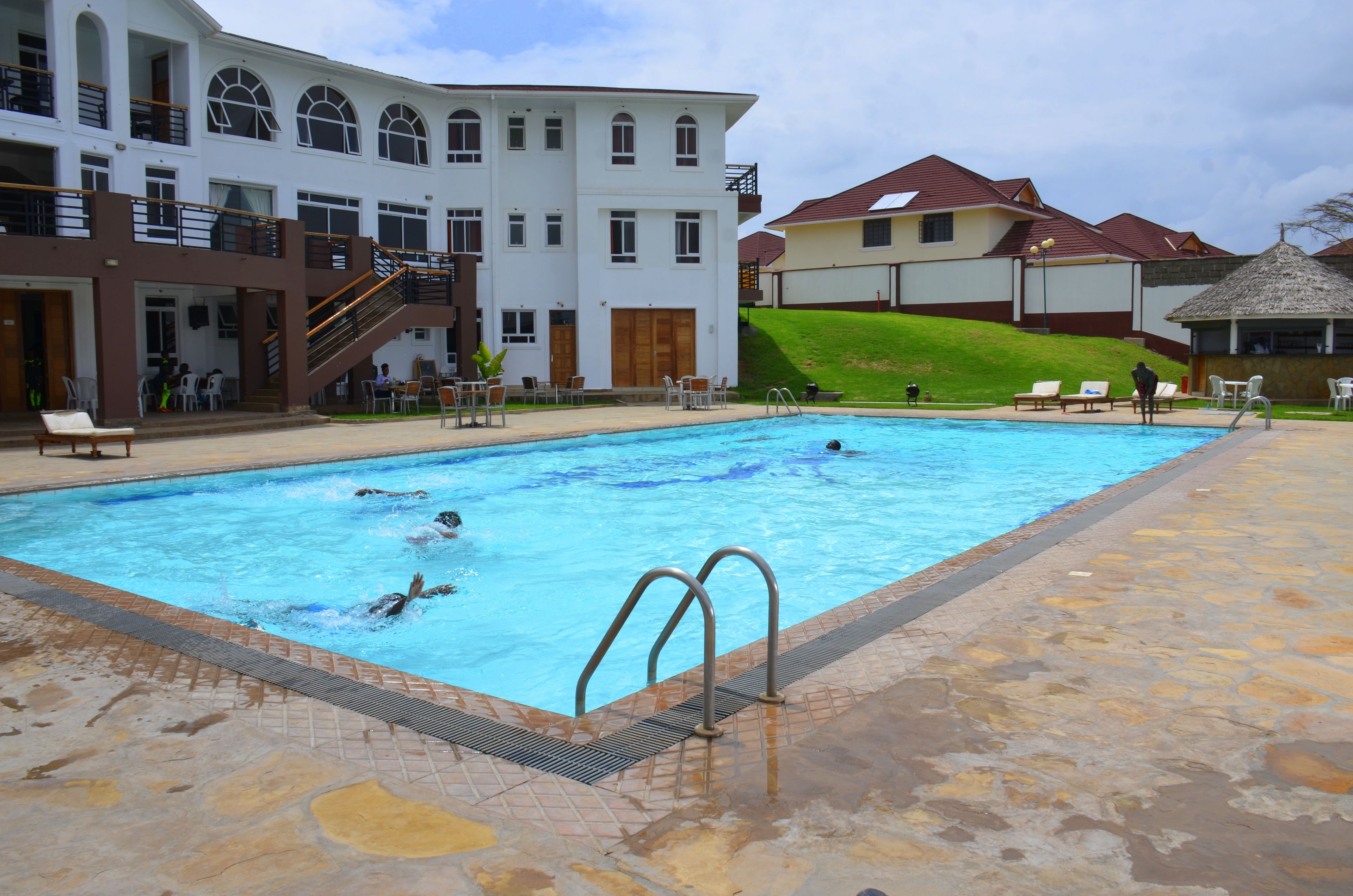 Outdoor pool, pool umbrellas, sun loungers