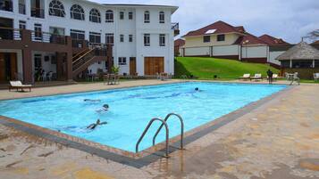 Outdoor pool, pool umbrellas, sun loungers