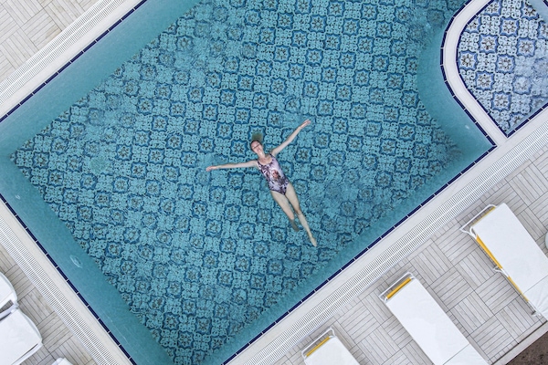 Seasonal outdoor pool, open 6:00 AM to midnight, free cabanas