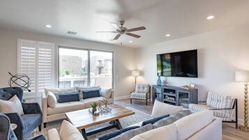 Townhome, Multiple Beds (Hermes Hideaway) | Living room | 60-inch flat-screen TV with cable channels, TV, table tennis